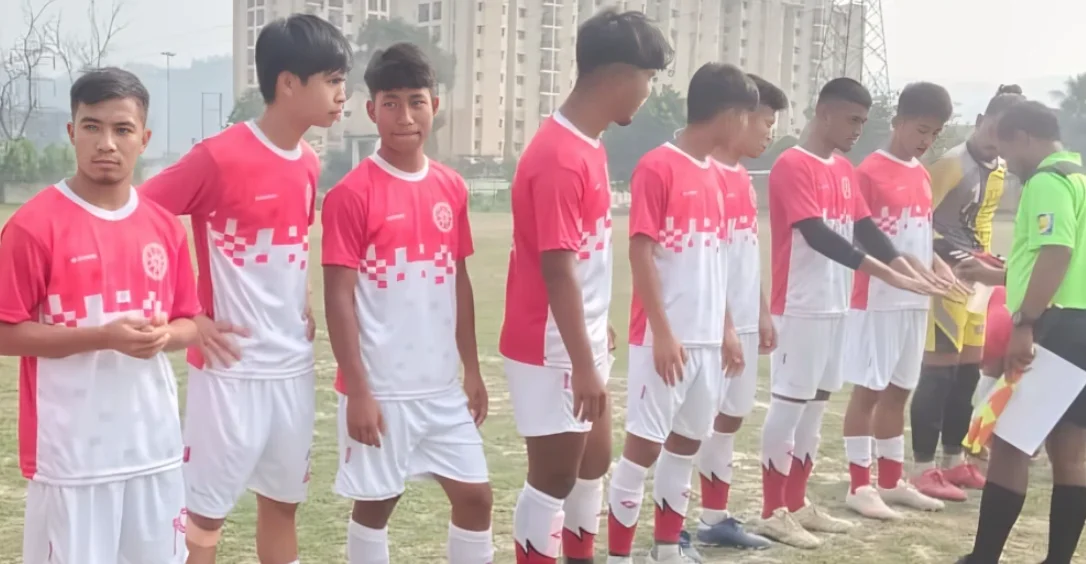 ICFAI FC players in red and white kit lined up before a match at the North East Inter-University Tournament